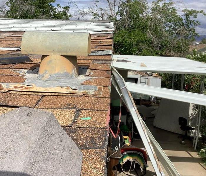 Storm damaged Roof & Awning